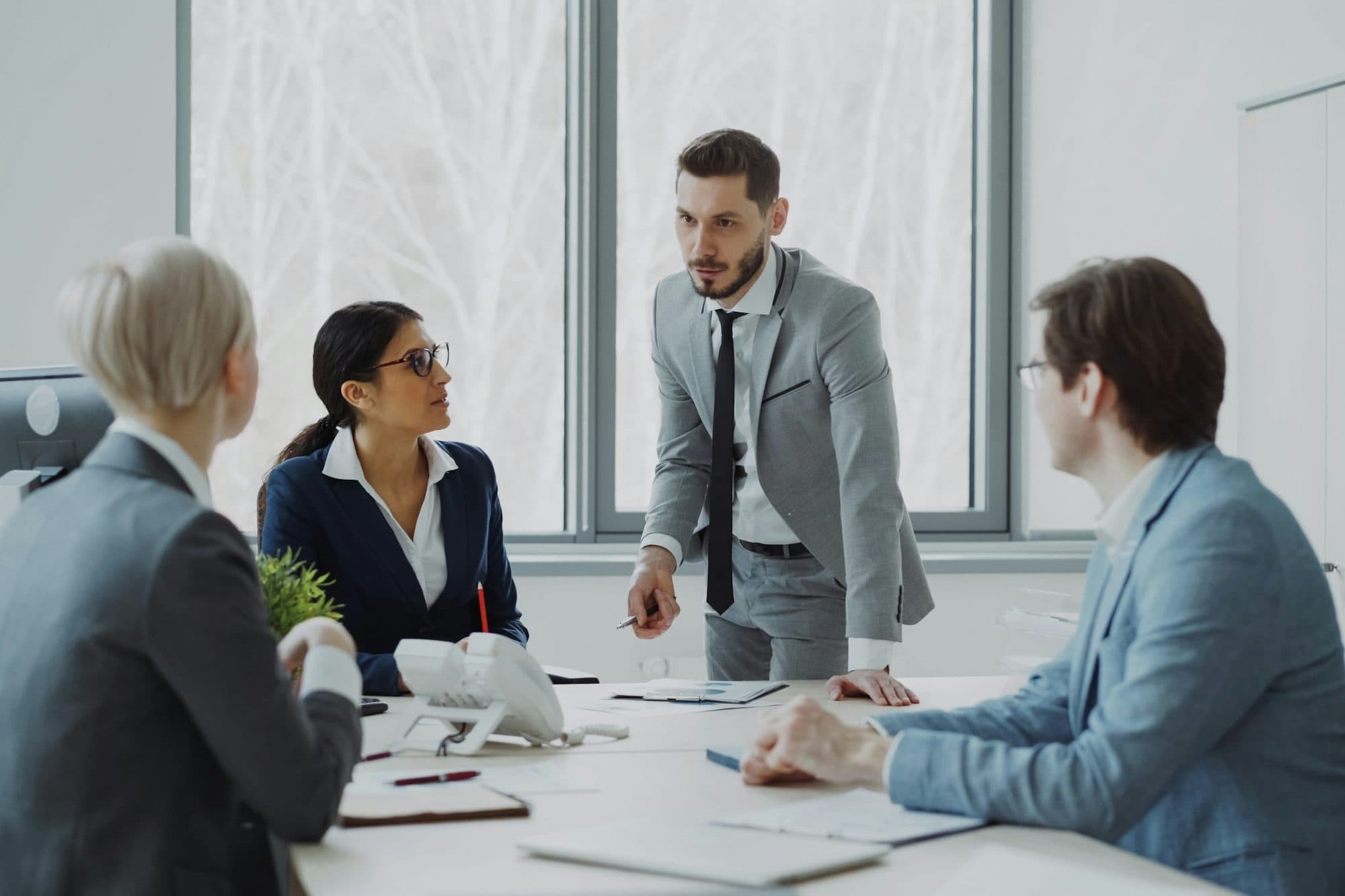 Senior leaders in a boardroom discussion